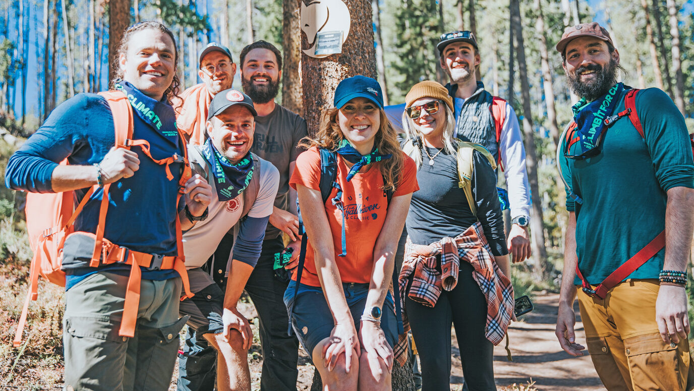 A team stops along the trail at the Climb it for Climate hiking event in Vail, Colorado an event that benefits Walking Mountains Science Center