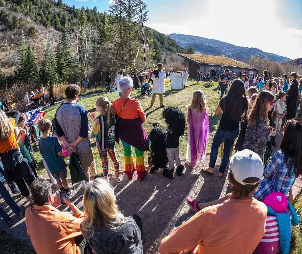 Participants Gathered Around the Meadow in Costumes